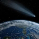 Galactic Sugar Stuns Origin Theories A comet streaking through space above Earth