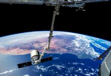 Webb Finds Ghost Planet View of Earth from the International Space Station with a satellite in focus
