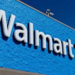 Walmart store sign on a blue wall