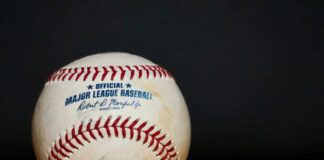 Major League Baseball ball with commissioner signature and logo.