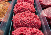 Grass-Fed Gambit Shakes Fast Food Ground beef on display at a butcher shop.