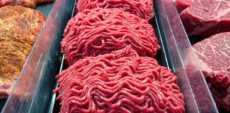 Ground beef on display at a butcher shop.