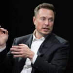 Musk’s $100M Midterm Playbook Elon Musk in a suit talking.
