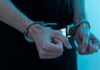 Armed Stalker Caught At Trump Golf Club? Close-up of hands in handcuffs
