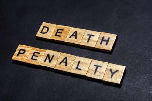 Photo,Of,The,Words,Death,Penalty,On,Wooden,Squares Wooden letter tiles spelling DEATH PENALTY on a dark background