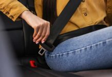 Twisted Belts, Big Recall NHTSA logo displayed on a smartphone screen