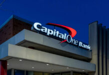 Capital One Bank building at night sky background