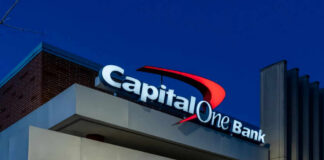 Capital One Bank building at night sky background