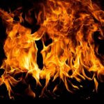 VIDEO: House Inferno, Gunfire — Kids Among Dead Bright flames dancing against a dark background
