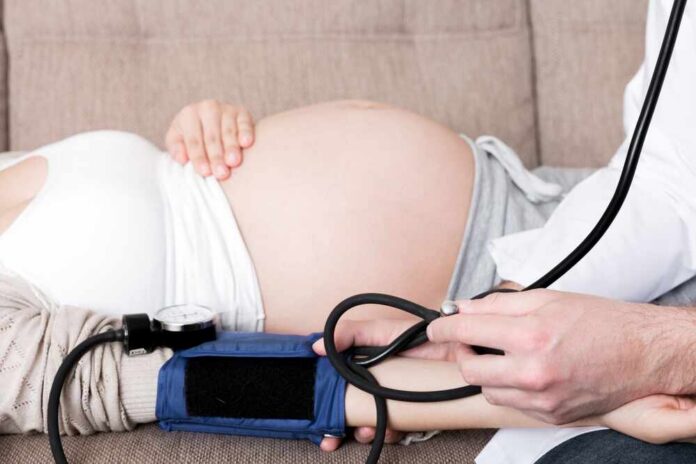 High,Pressure,Problem,During,Pregnancy.,Gynecologist,Measures,Blood,Pressure,For Doctor measuring blood pressure of a pregnant woman