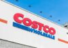 Costco Burritos Hidden Ingredient — Health Alert Costco Wholesale store sign against a blue sky