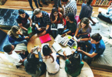 Court Shutout Stings Meta Over Teen Addiction Group of young adults studying in a library.