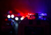 Face Slashed, No Words, Brutal Attack Police car lights shining in the dark.