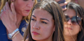 woman in red top at outdoor event