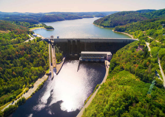 shutterstock_1496907197 Aerial view of a large dam and reservoir