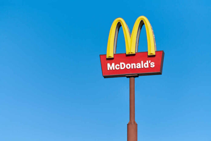 Moscow,,25.08.2019,-,Mcdonalds,Roadside,Cafe,Logo,,Copy,Space.,Mcdonald McDonald's restaurant sign against a clear blue sky