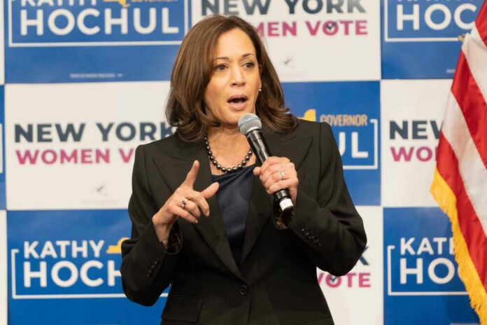 shutterstock_2222141825 Kamala Harris speaking at event for Kathy Hochul.