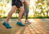 Death Risk PLUNGES With Fewer Steps Two individuals walking on a path during sunset