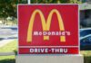 Billion-Dollar Bet: McDonald’s Gambles Big McDonald's drive-thru sign with iconic golden arches