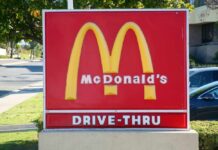 Billion-Dollar Bet: McDonald’s Gambles Big McDonald's drive-thru sign with iconic golden arches