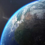 DISCOVERY: Deep-Earth Anomalies Stun Geologists Earth from space with sun in background.