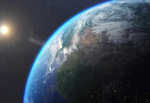 DISCOVERY: Deep-Earth Anomalies Stun Geologists Earth from space with sun in background.