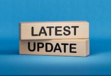 UPDATE: ICE Shooting Sparks Arrest of Officer Wooden blocks with the words latest update on blue background