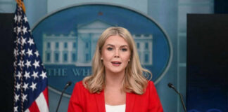 Woman speaking at a White House press briefing podium