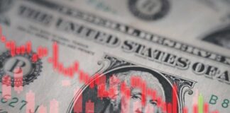 US dollar bill with red stock candlestick chart overlay