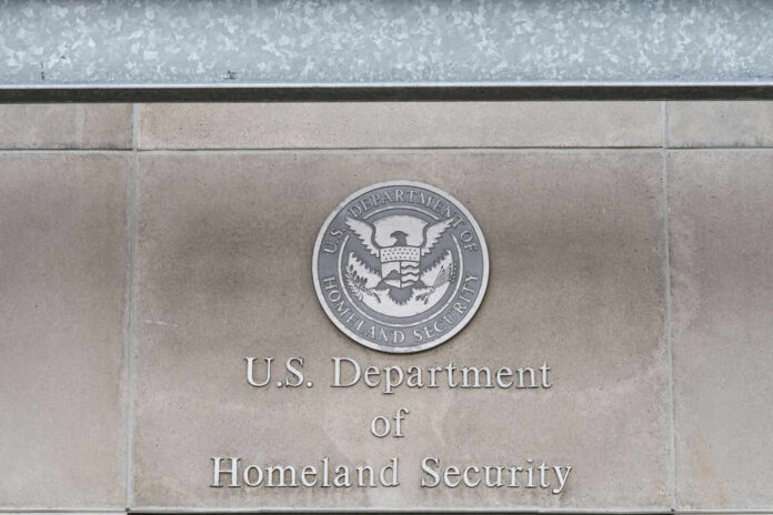 shutterstock_387869113 Department of Homeland Security sign with emblem