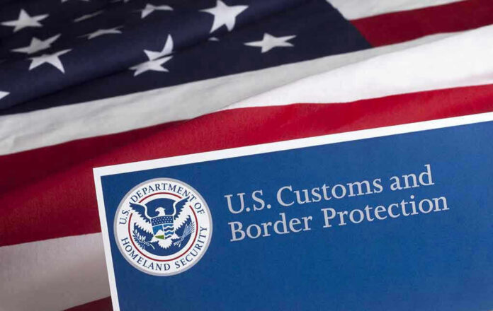 300476903 U.S. Customs and Border Protection logo and American flag.
