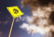 FDA Alert: Deadly Weight-Loss Shots Yellow warning sign with skull symbol under dramatic cloudy sky
