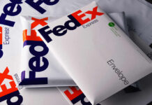 Various FedEx envelopes stacked together