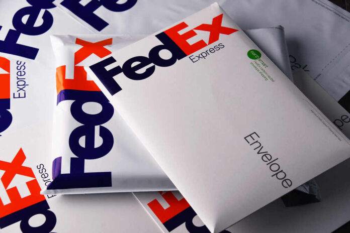 Various FedEx envelopes stacked together